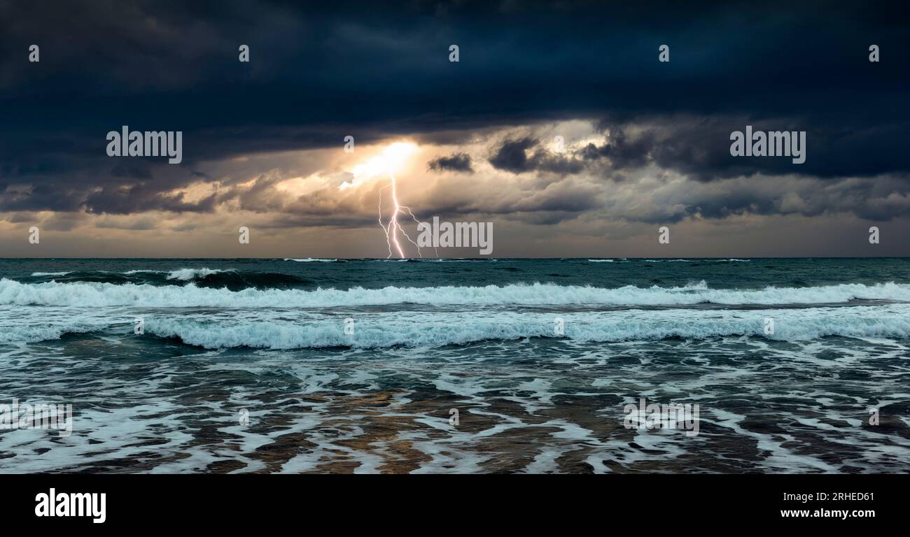 Dramatic dark stormy sky and lightning over a sea Stock Photo - Alamy