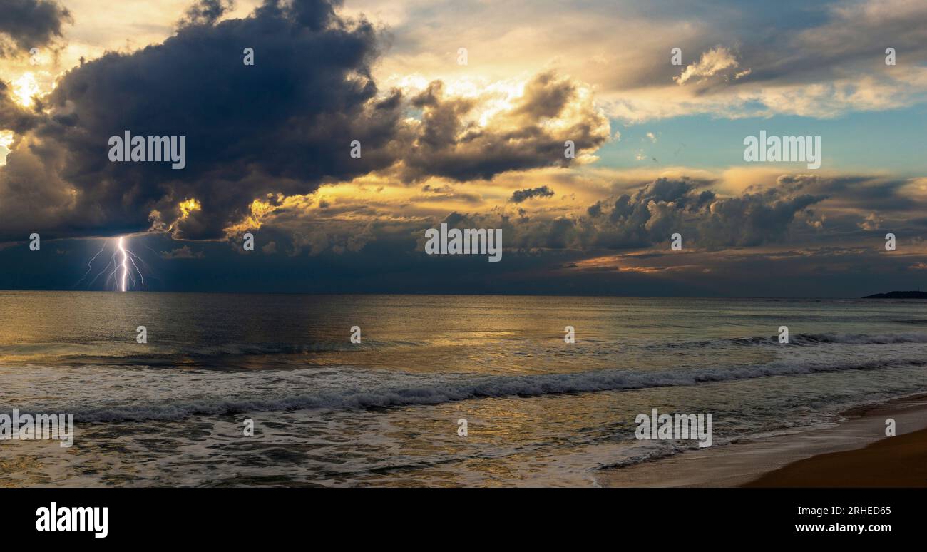 Dramatic dark stormy sky and lightning over a sea Stock Photo - Alamy