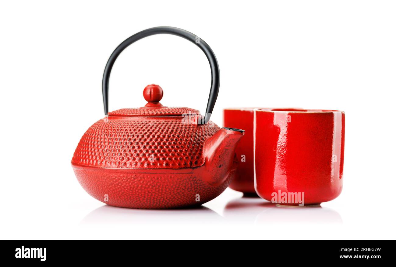 Iron teapot and cups. Isolated on white background Stock Photo Alamy