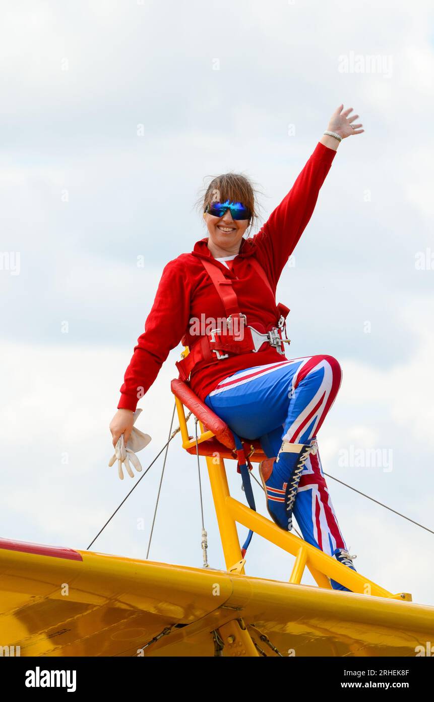 Helen Tempest, long time wing walker, wing walking in Union Jack flag ...