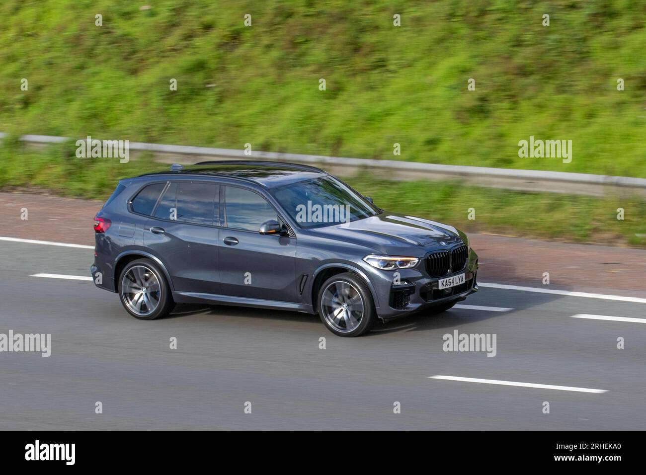 2020 BMW X5 M50d Auto Xdrive M50d 7St Auto Start/Stop Grey Car SUV Diesel 2993 cc travelling at speed on the M6 motorway in Greater Manchester, UK Stock Photo