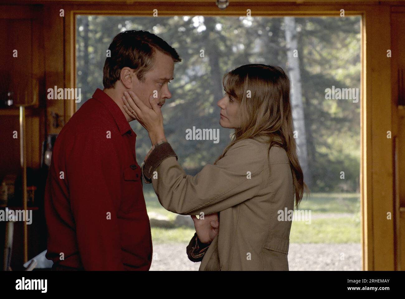 (LR)Michael Dorman as Joe Pickett and Julianna Guill as Marybeth