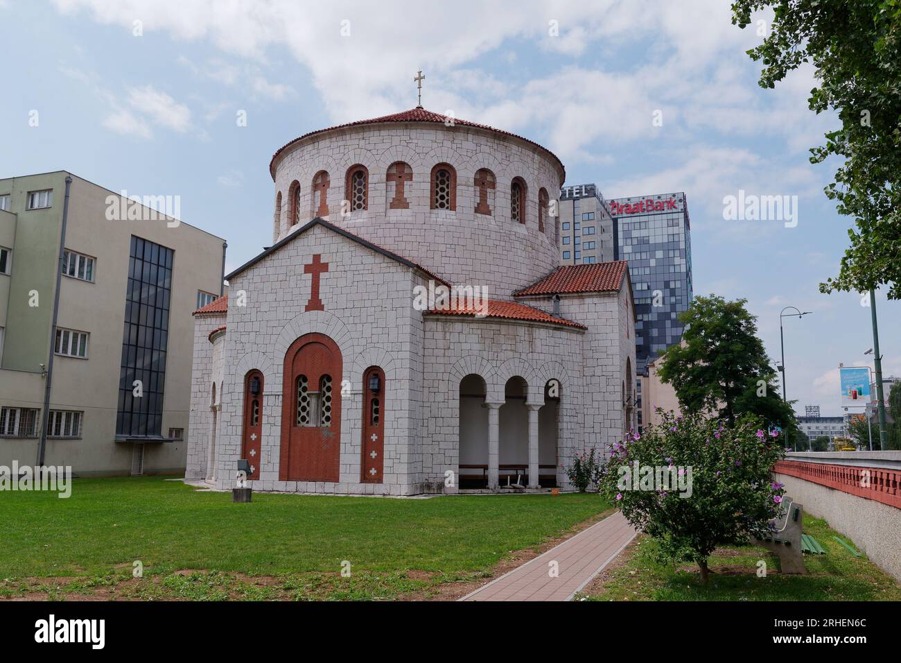 Church of the Holy Transfiguration  the city of Sarajevo surrounded by hotels, Bosnia and Herzegovina, August 16,2023. Stock Photo