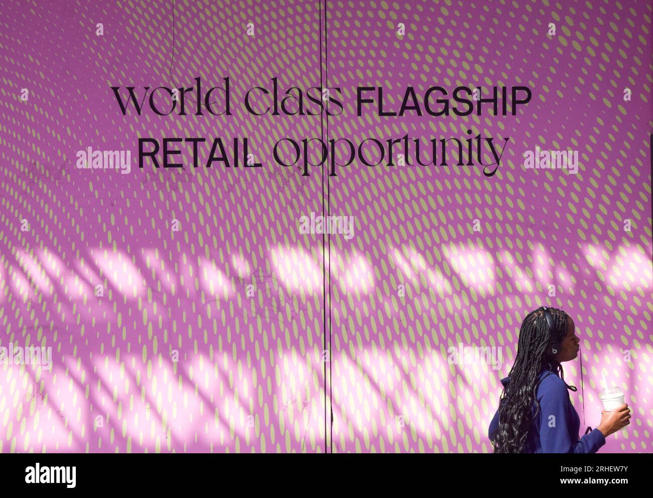 London, England, UK. 16th Aug, 2023. A woman walks past a new shopping development on Oxford Street as retail leaders warn that high streets are continuing to decline and call for government-backed regeneration. (Credit Image: © Vuk Valcic/ZUMA Press Wire) EDITORIAL USAGE ONLY! Not for Commercial USAGE! Stock Photo