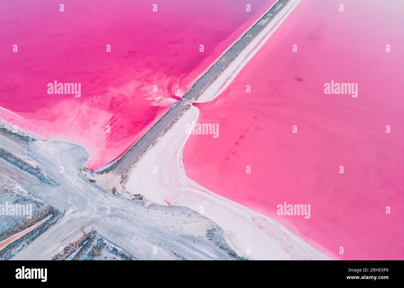 Aerial View Of Pink Salt Lake Salt Production Plants Evaporated Brine aerial-view-of-pink-salt-lake-salt-production-plants-evaporated-brine