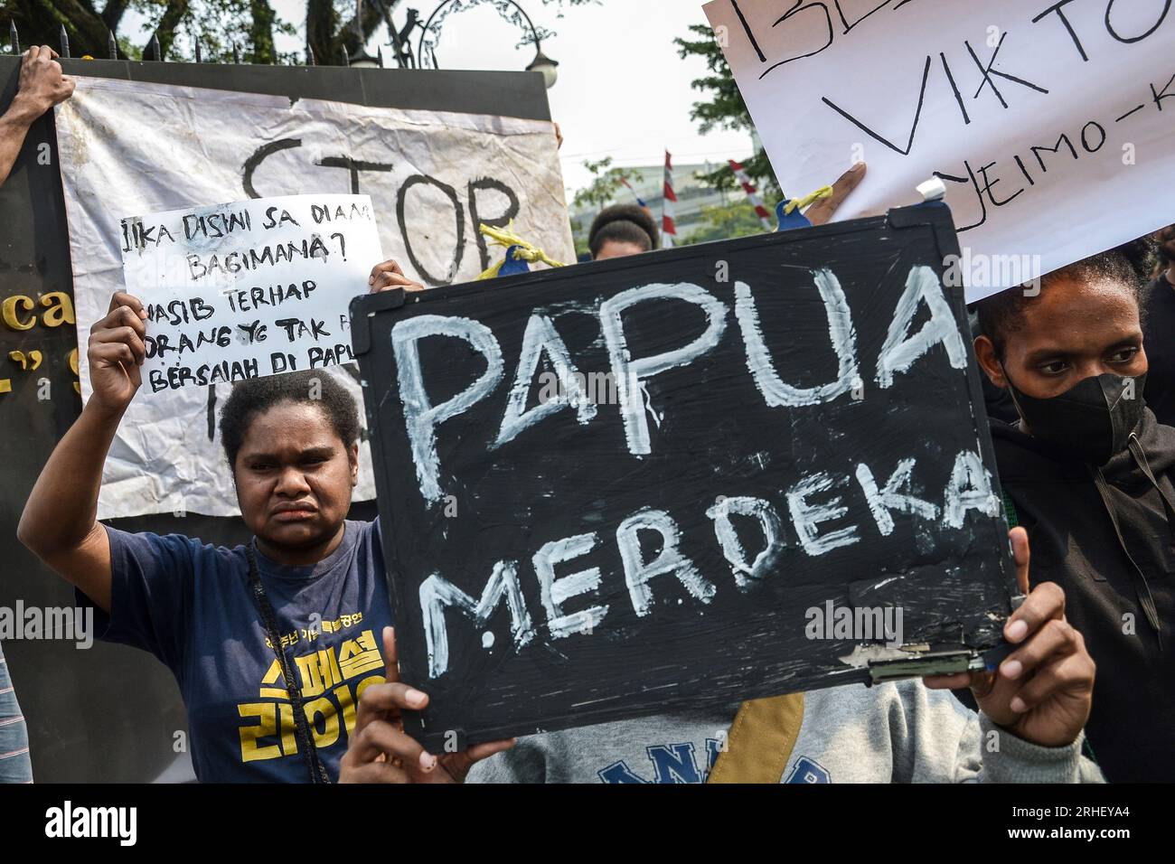 Dozens of people who are members of the Papuan Student Alliance, the ...