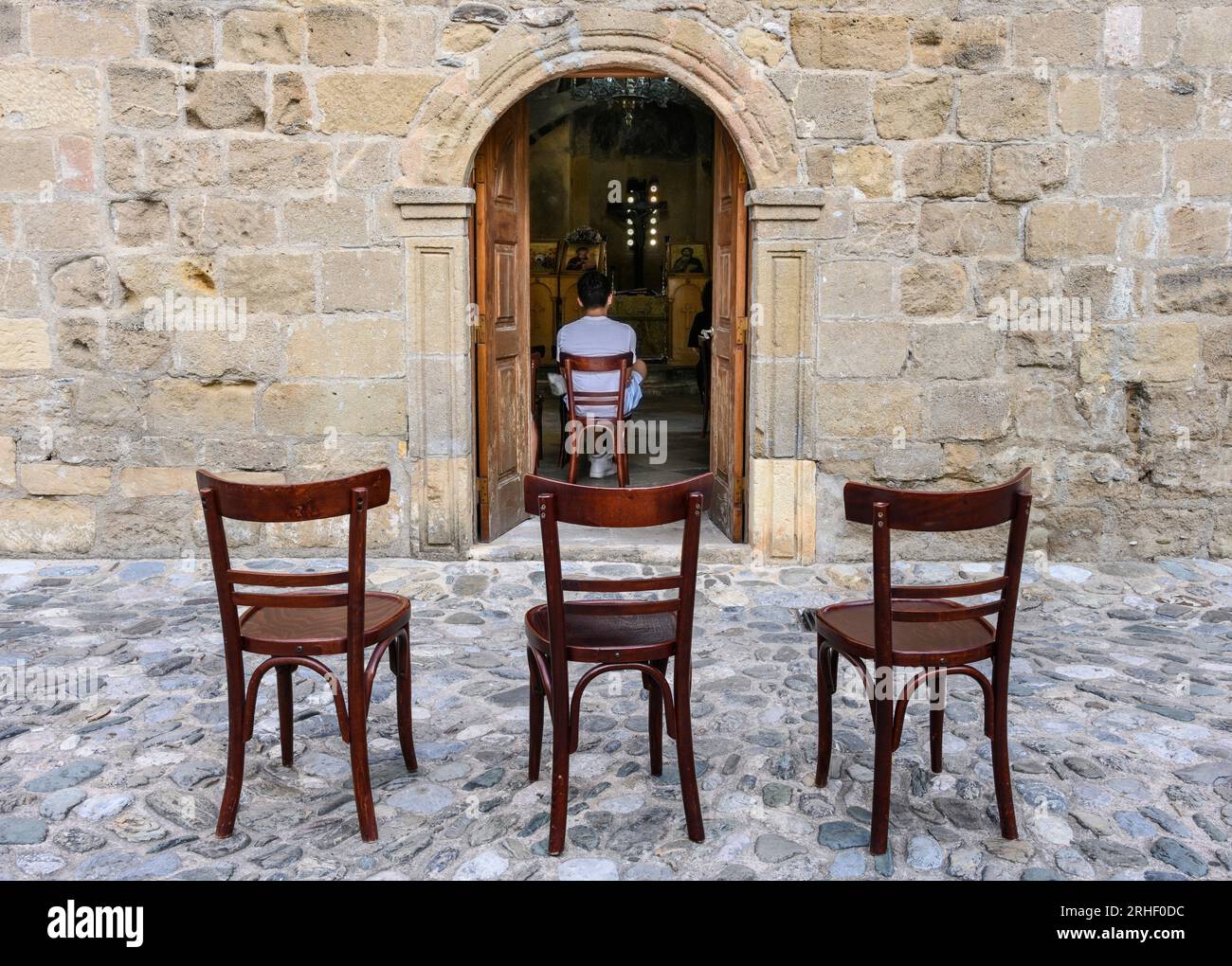 A service in the 13th century Byzantine church of Agii Apostoli in the old quater of Kalamata. The Greek War of Independence was formally declared her Stock Photo