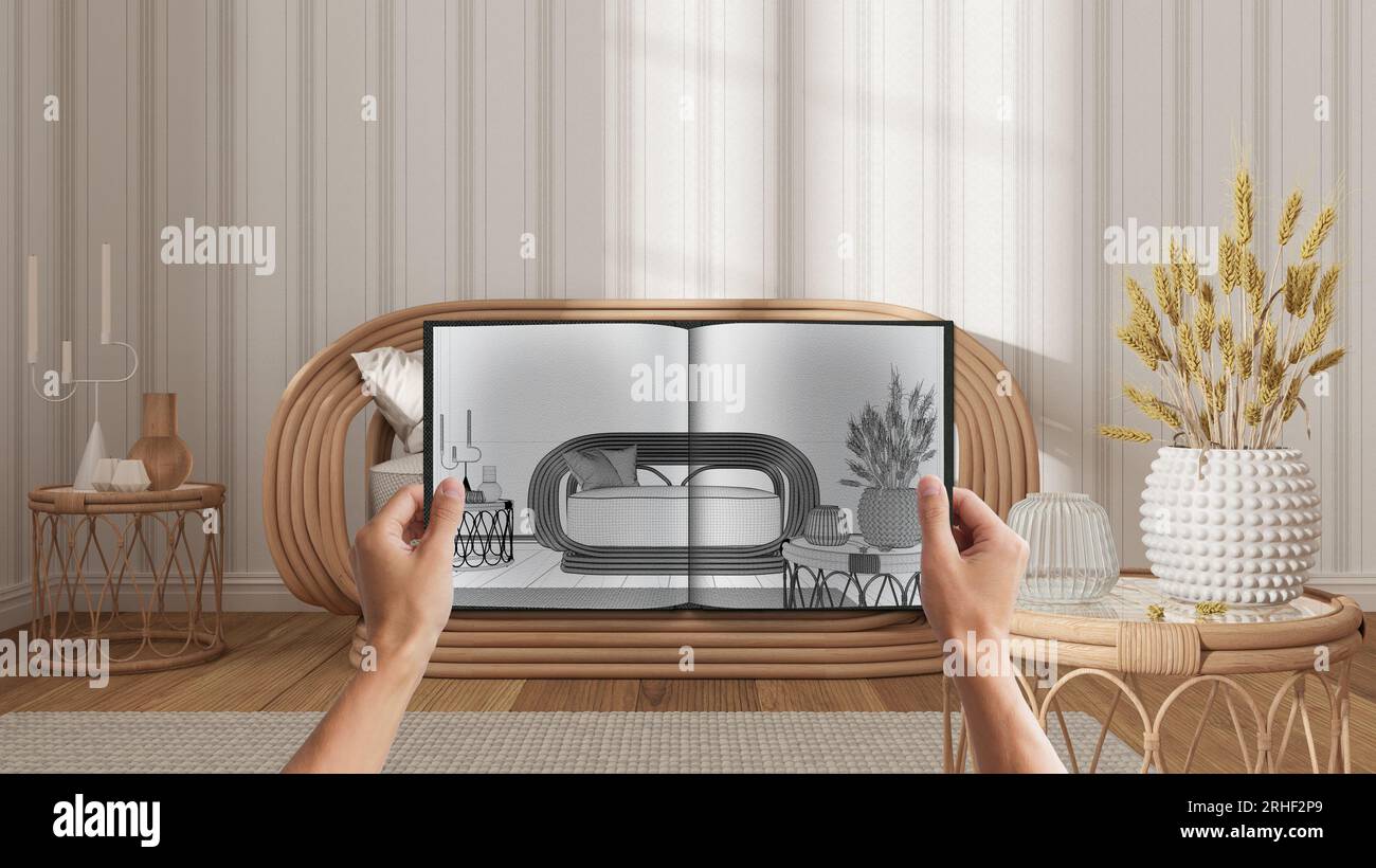 Hands holding notepad with beige living room design blueprint sketch or ...