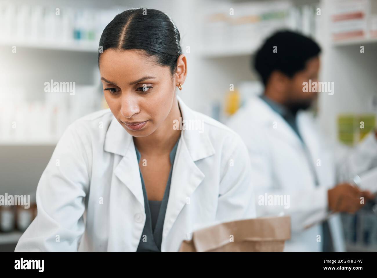 Pharmacy, medicine and inventory with woman in store for retail, pills