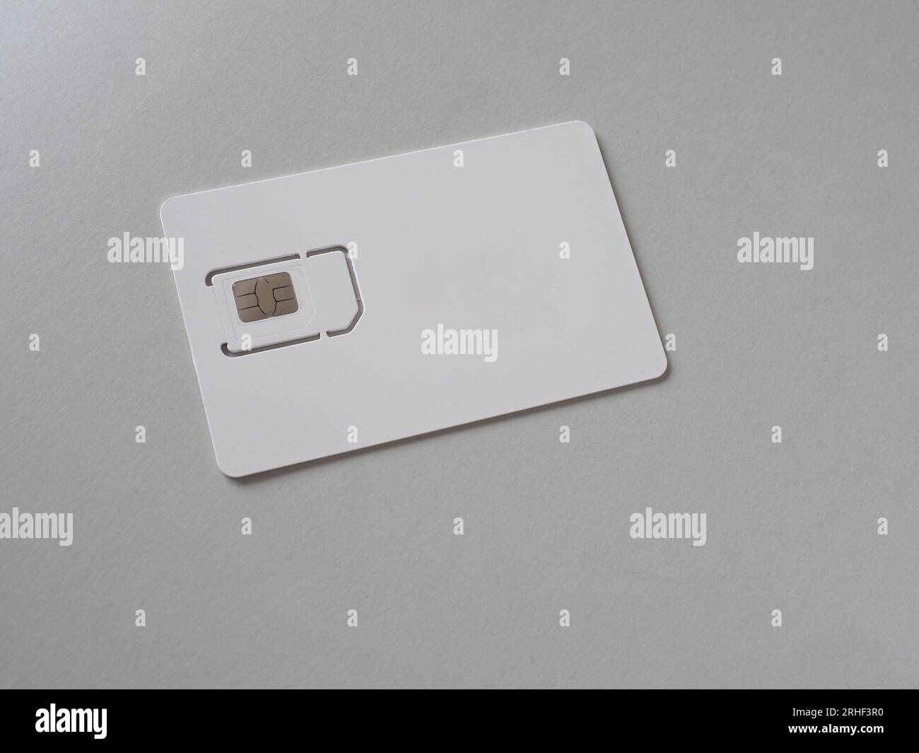 blank triple cut mini micro nano sim card with copy space Stock Photo