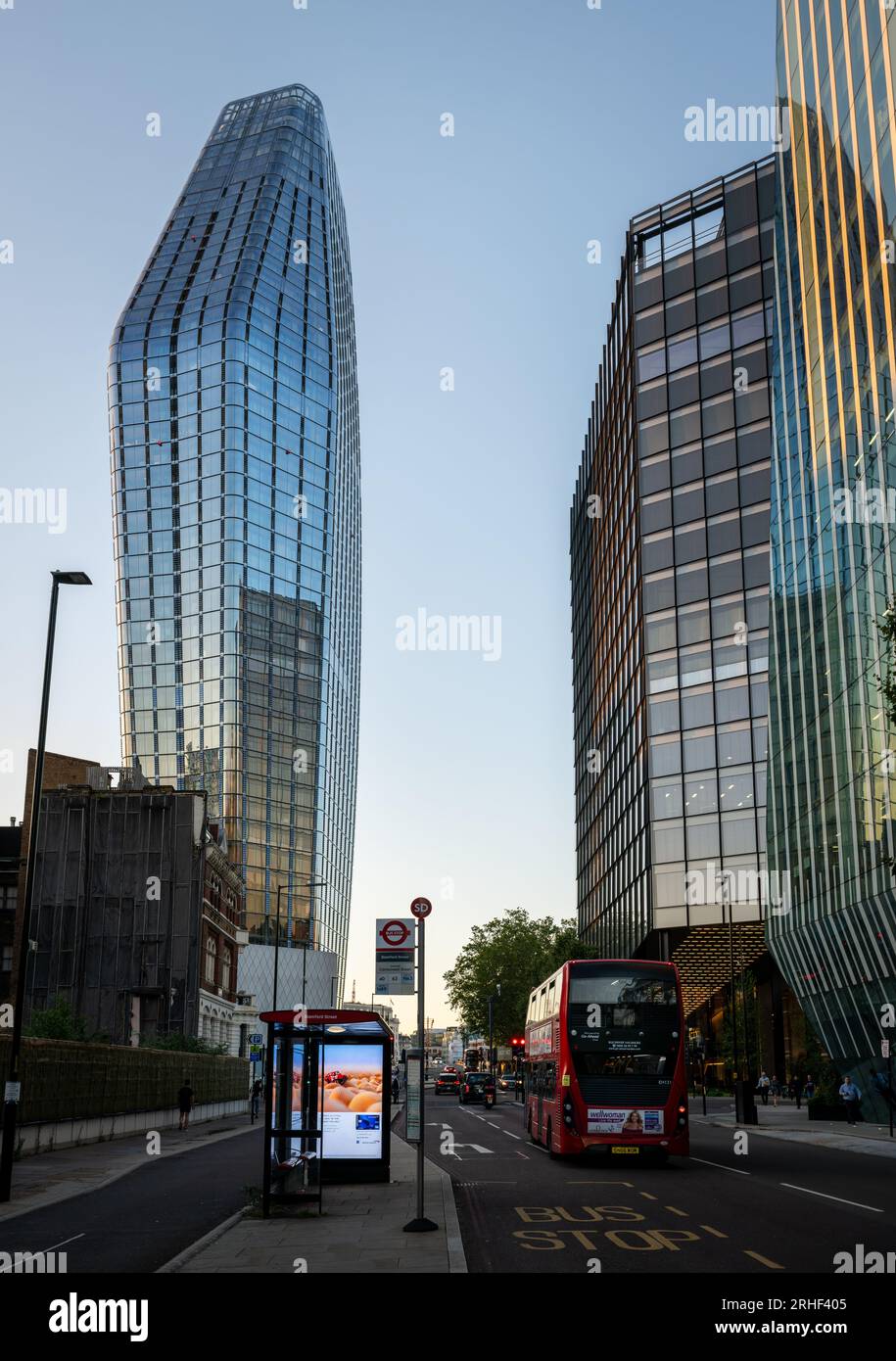London, UK: Blackfriars Road in Southwark, London with the One Blackfriars skyscraper (left). Red London bus and bus stop in foreground. Stock Photo