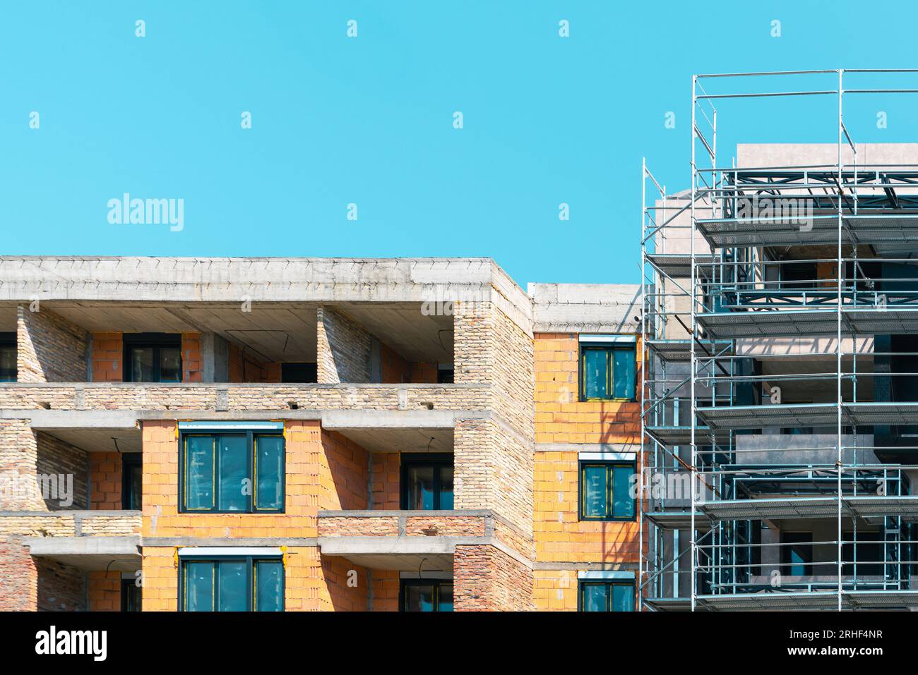 Construction site, building multi-storey buildings apartment in the city. Stock Photo