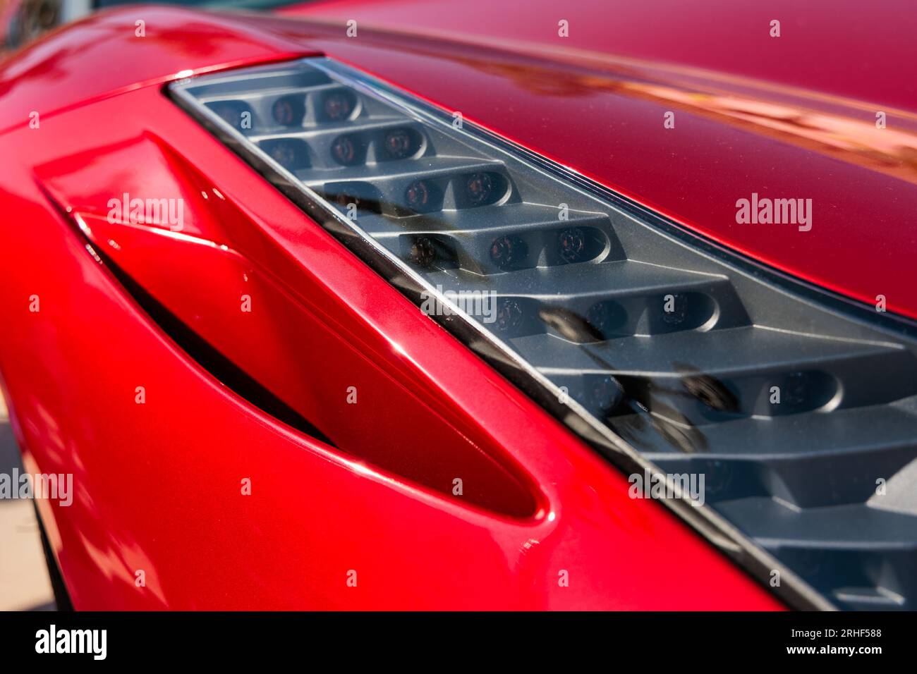 Ferrari 458 Spider, close up view of front headlamps Stock Photo