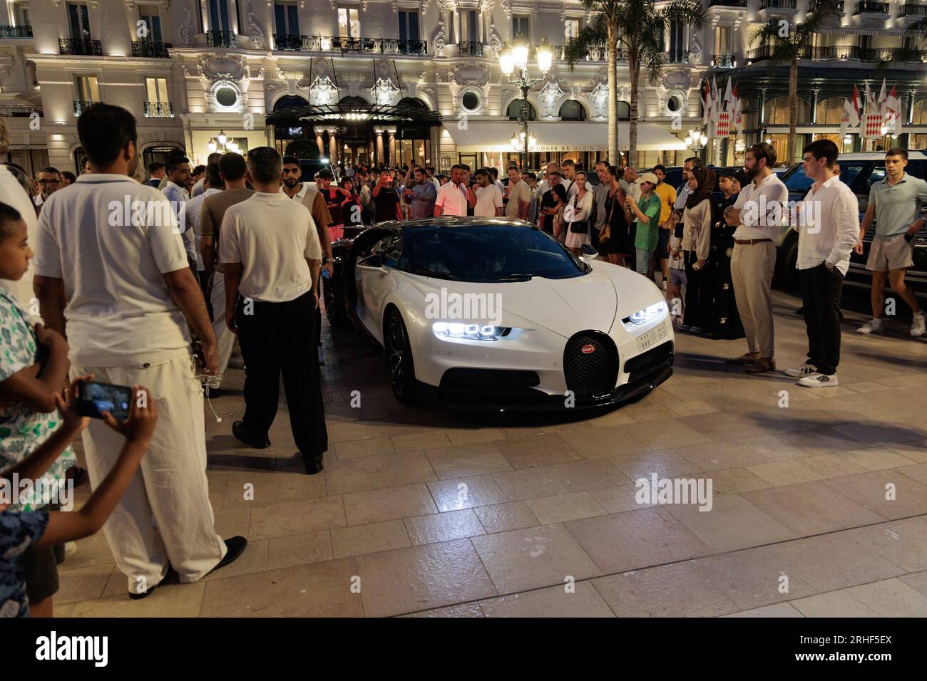 Bugatti Chiron driving into Casino Square in Monte Carlo, Monaco Stock Photo
