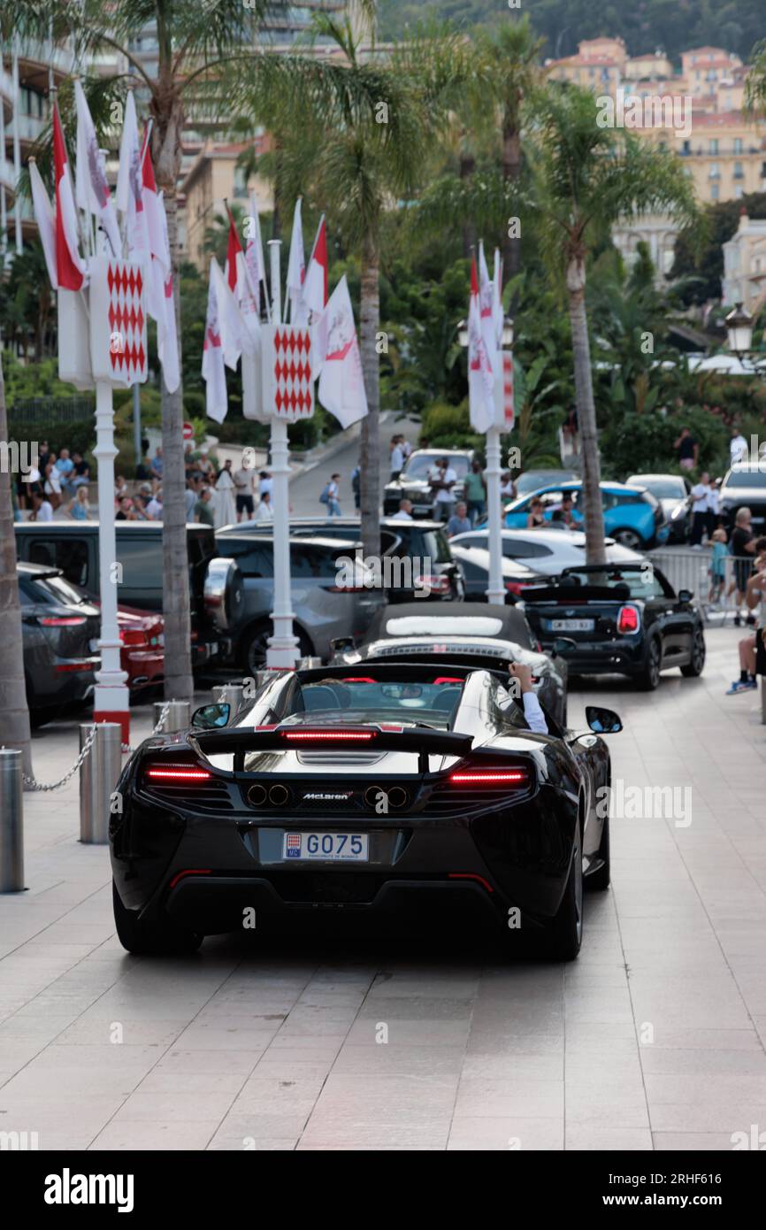 McLaren 675LT driving through Casino Square in Monte Carlo, Monaco Stock Photo