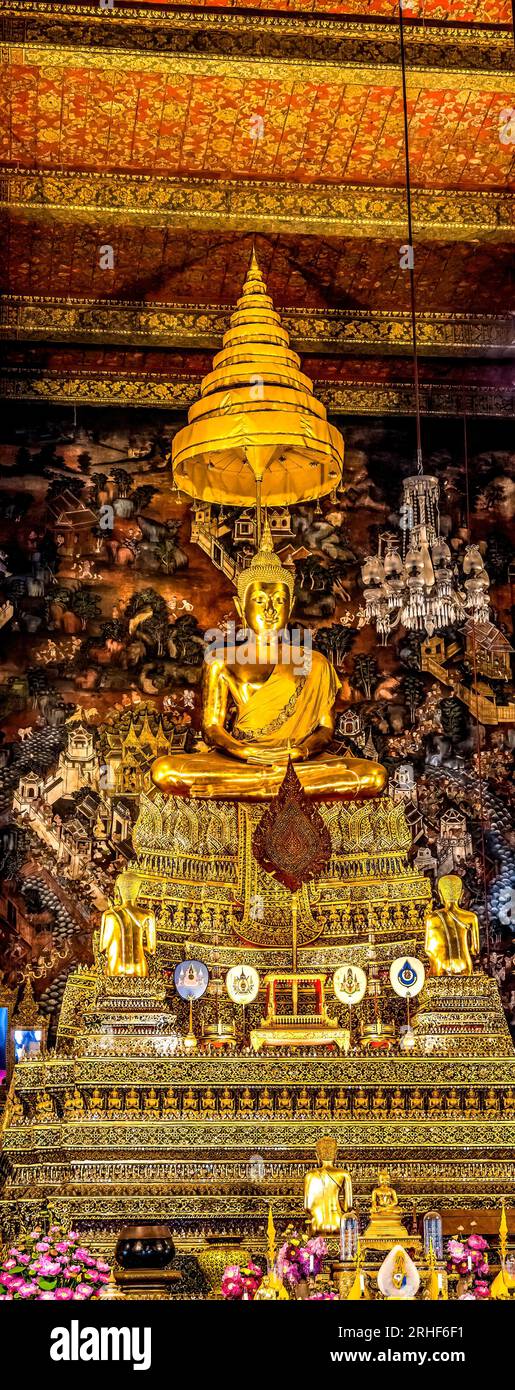 Coloful Golden Historical Buddha Under Umbrella Phra Buddha Ubosot Ordination Hall Wat Pho Po Temple Complex Bangkok Thailand. Temple built in 1600s. Stock Photo