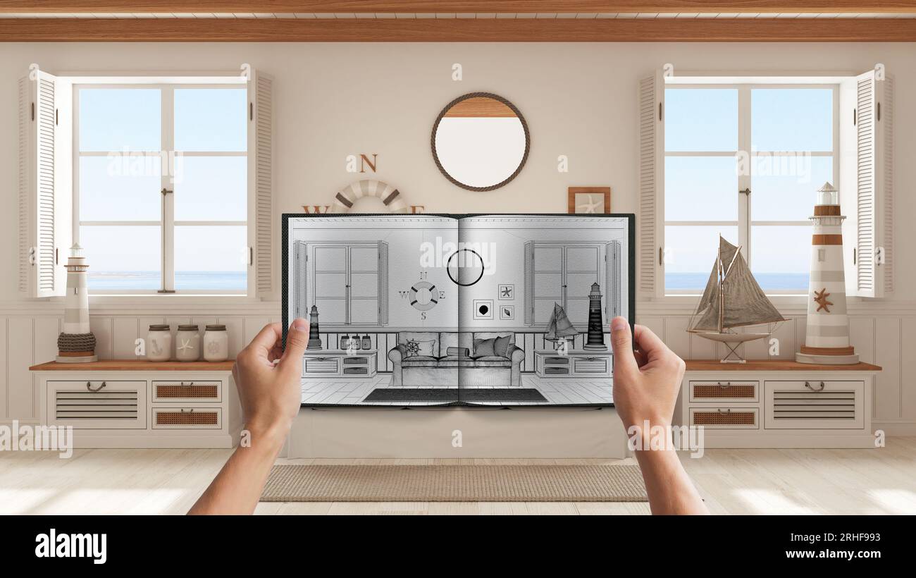 Hands holding notepad with marine living room design blueprint sketch ...