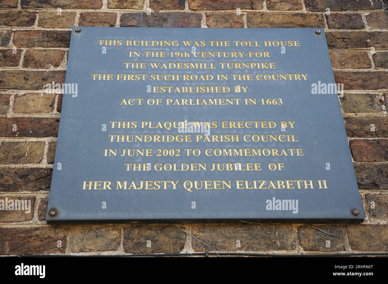 Plaque on former Toll house, Wadesmill, Hertfordshire Stock Photo