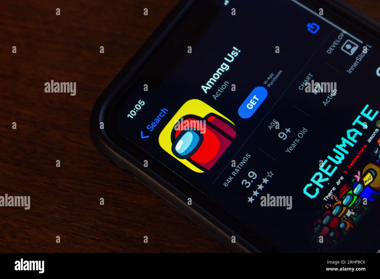 logo of Among Us App seen in App Store on iPhone. Among Us is a 2018