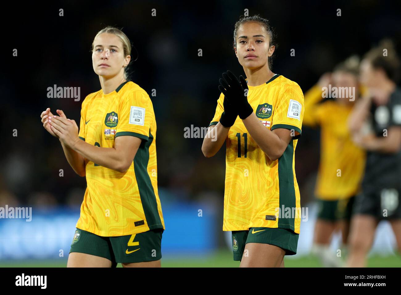 Australias Mary Fowler Right And Australias Courtney Nevin Applaud Supporters Following The 3221