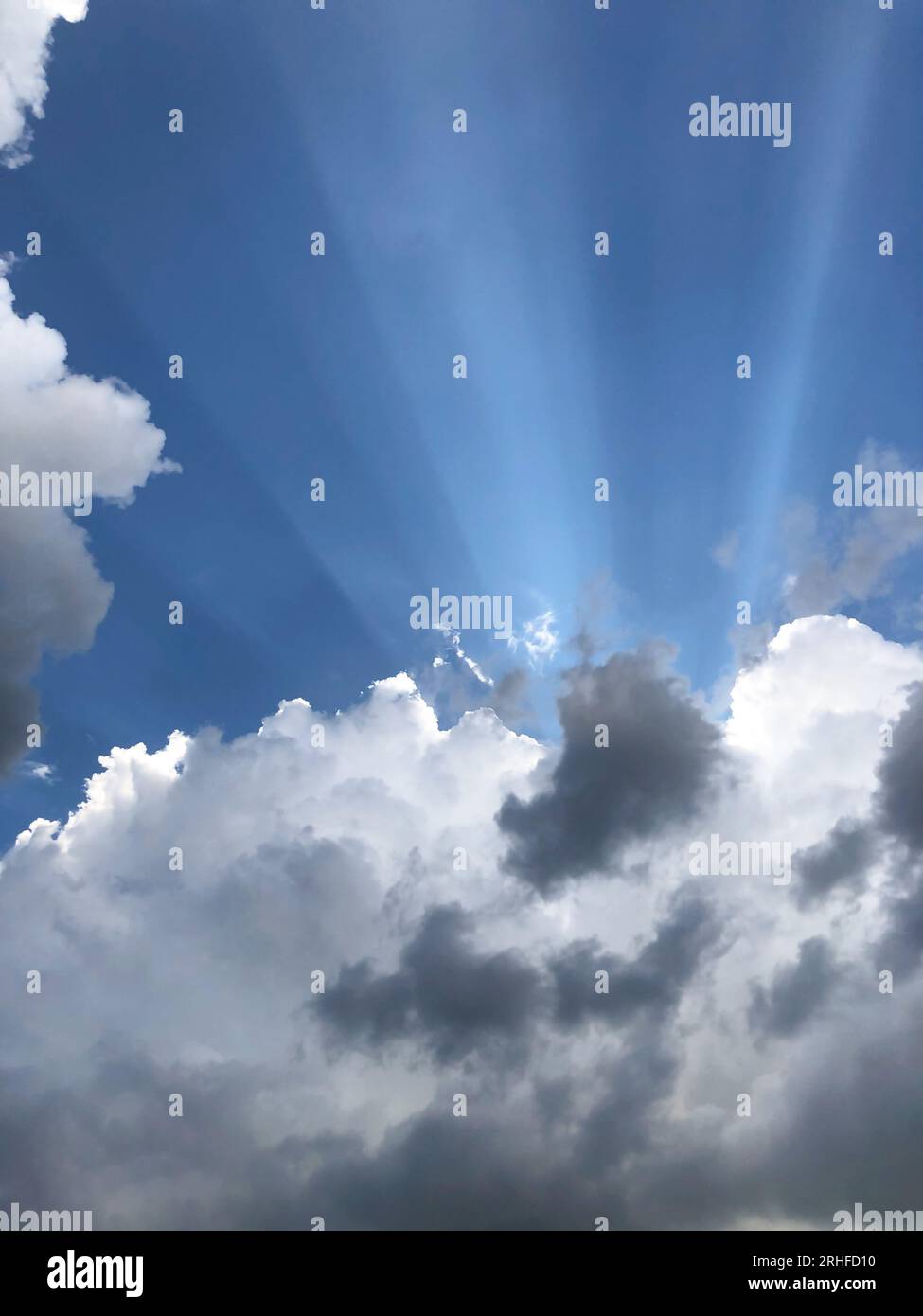 Blue sky with white and black clouds hi-res stock photography and ...