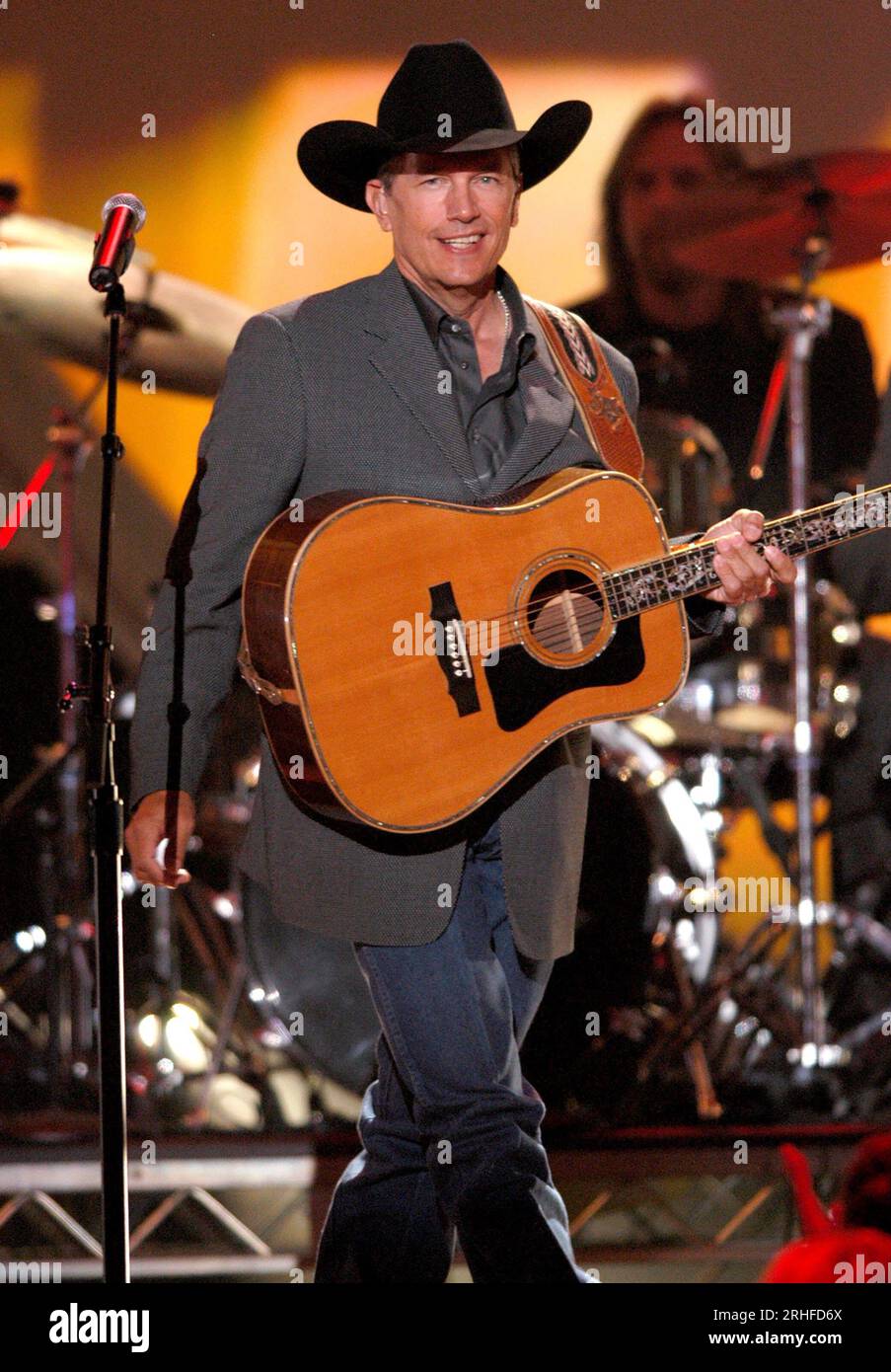 George Strait performing at the ACM Awards, 2004. ph: Ron Wolfson ...