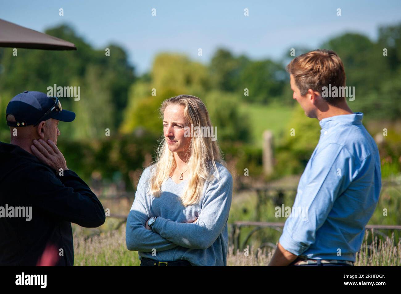 Stamford, UK. 16th Aug, 2023. Burghley Ambassador and former winner Andrew Hoy talks to Defender Burghley First-Timer Greta Mason and Phil Brown, who is competing at the event for the second time, during the pre event media day ahead of the 2023 Defender Burghley Horse Trials held in the grounds of Burghley House in Stamford, Lincolnshire, England, United Kingdom. Credit: Jonathan Clarke/Alamy Live News Stock Photo