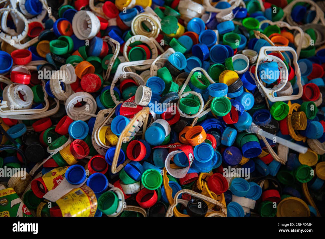 Colorful plastic bottle caps for recycling, Dhaka, Bangladesh Stock