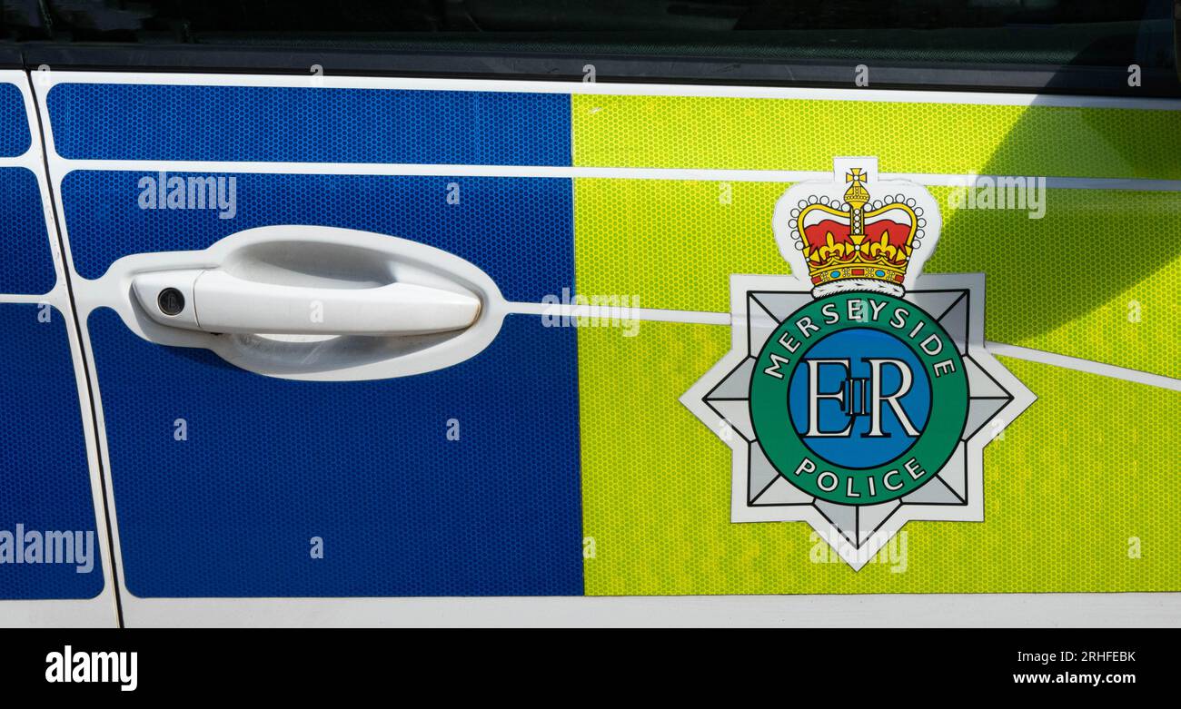 Merseyside Police car logo on door Stock Photo