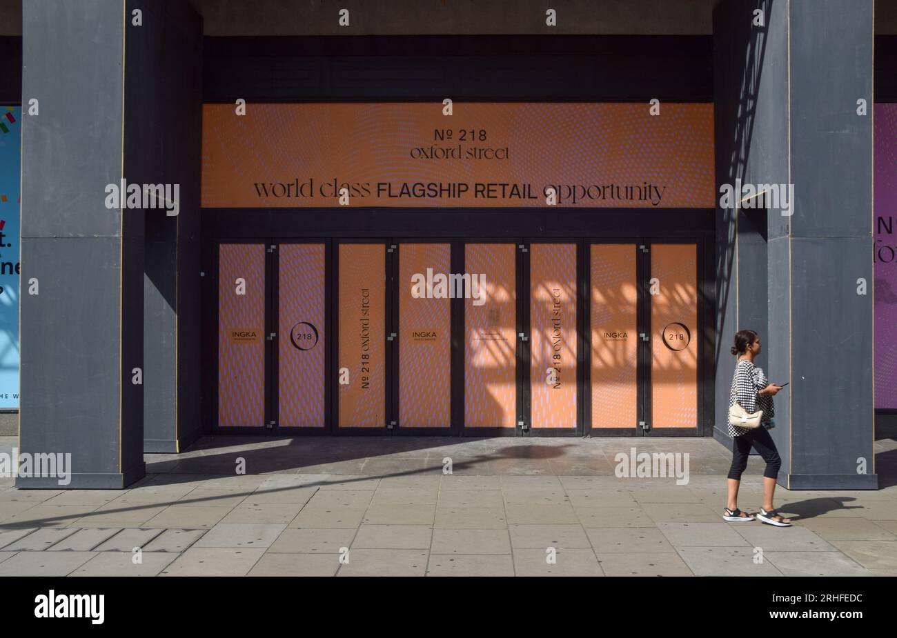 London, UK. 16th Aug, 2023. A woman walks past a new shopping development on Oxford Street as retail leaders warn that high streets are continuing to decline and call for government-backed regeneration. (Credit Image: © Vuk Valcic/SOPA Images via ZUMA Press Wire) EDITORIAL USAGE ONLY! Not for Commercial USAGE! Stock Photo
