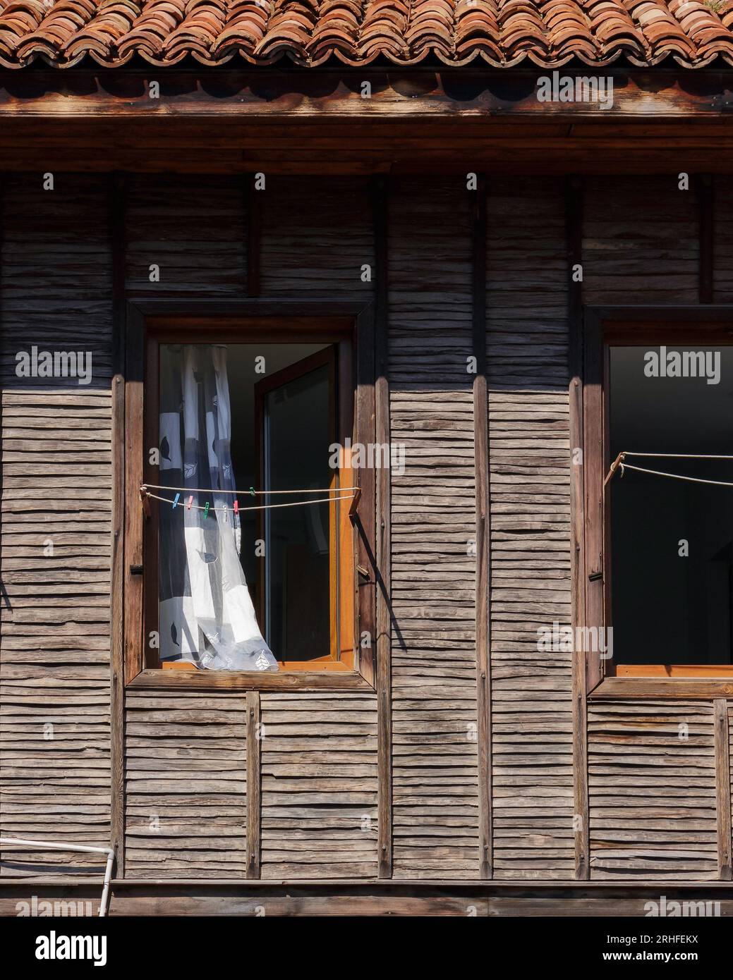 windows on the vintage wooden wall. ancient architecture Stock Photo