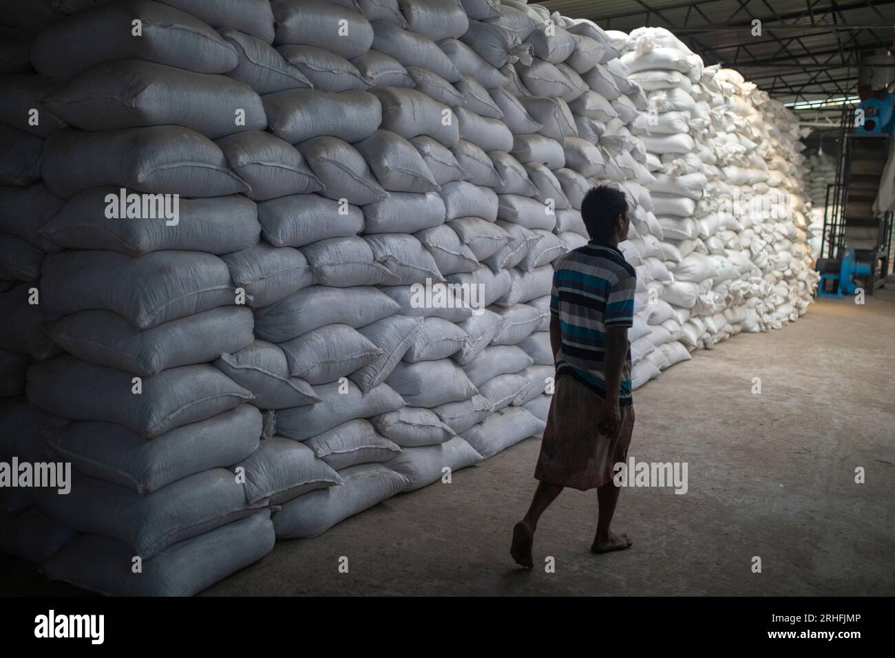 Sacks of plastic flakes made by used plastic bottles at a recycling plant in Dhaka, Bangladesh. Stock Photo
