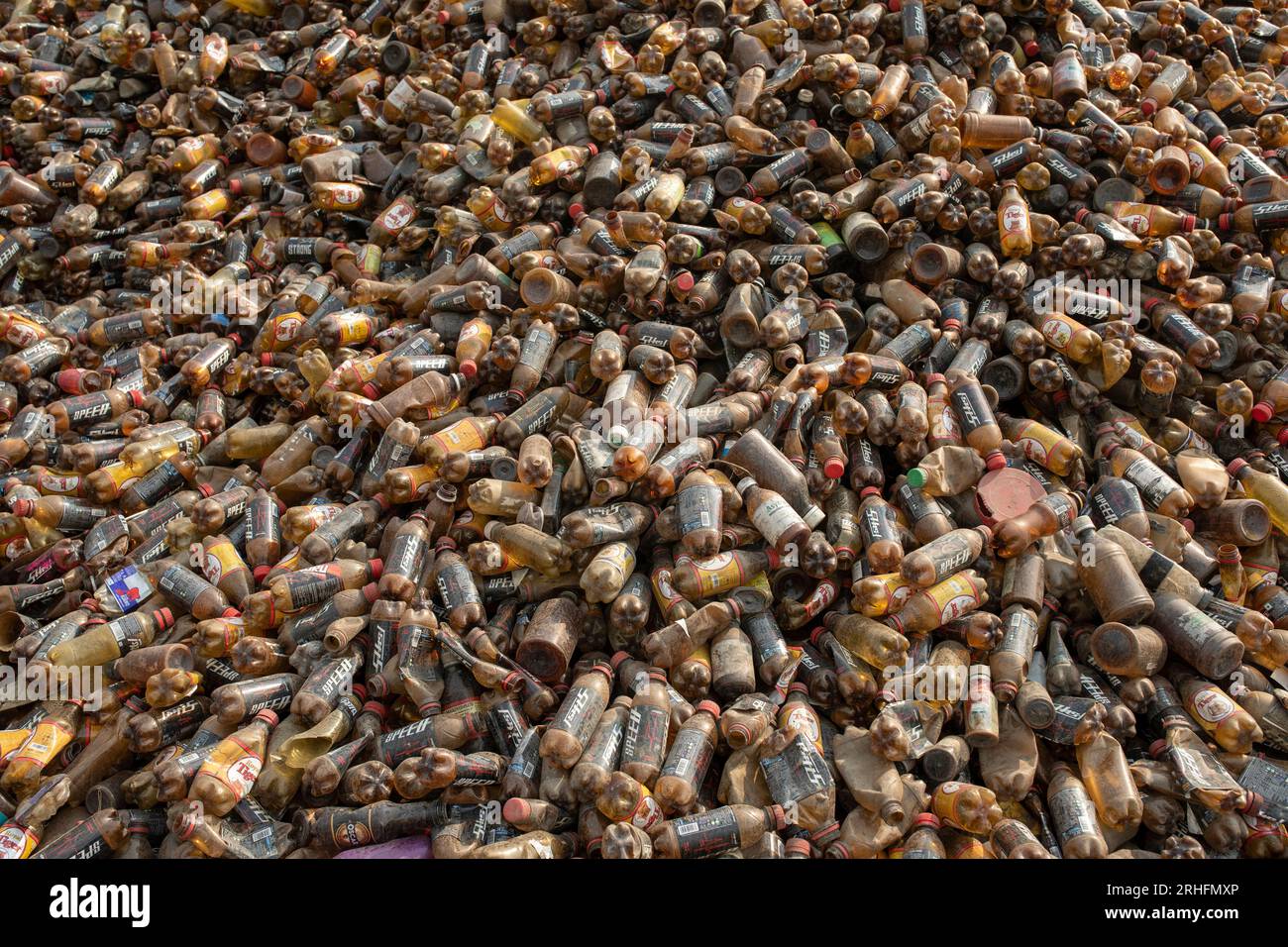 Different types of plastic bottles gathered for recycling in Dhaka, Bangladesh. Stock Photo