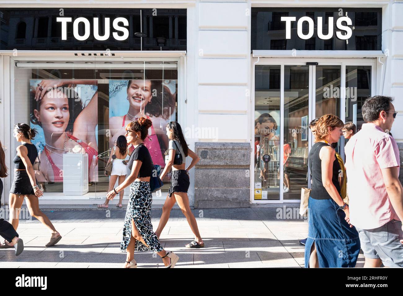 Madrid, Spain. 16th Aug, 2023. Pedestrians walk past the Spanish jewelry,  accessories, and fashion retailer Tous