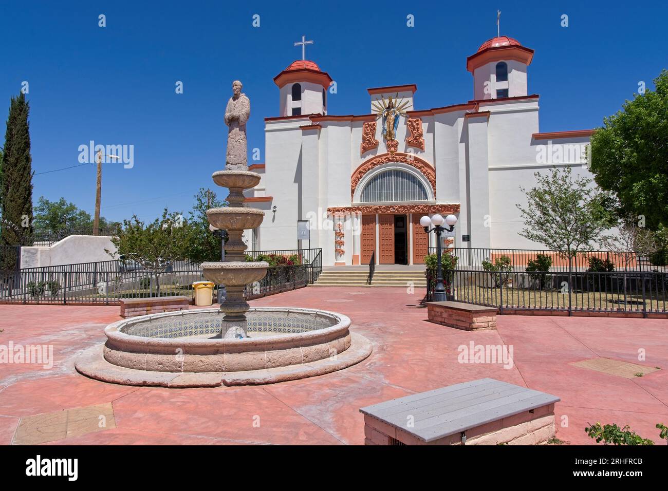 Plaza with water fountain before Our Lady of Health Catholic Church in