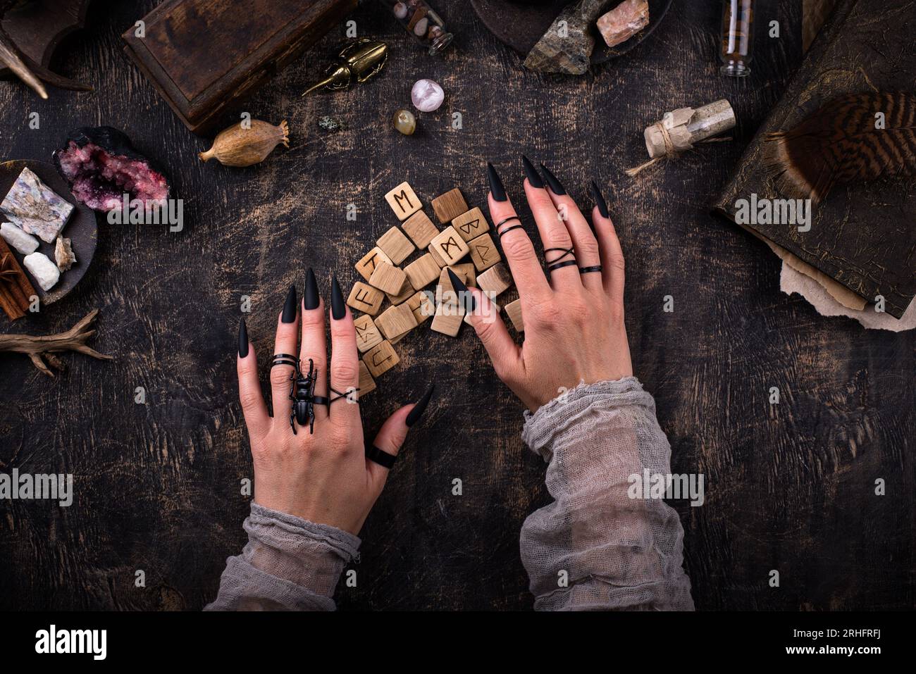 Esoteric magical background with runes Stock Photo - Alamy