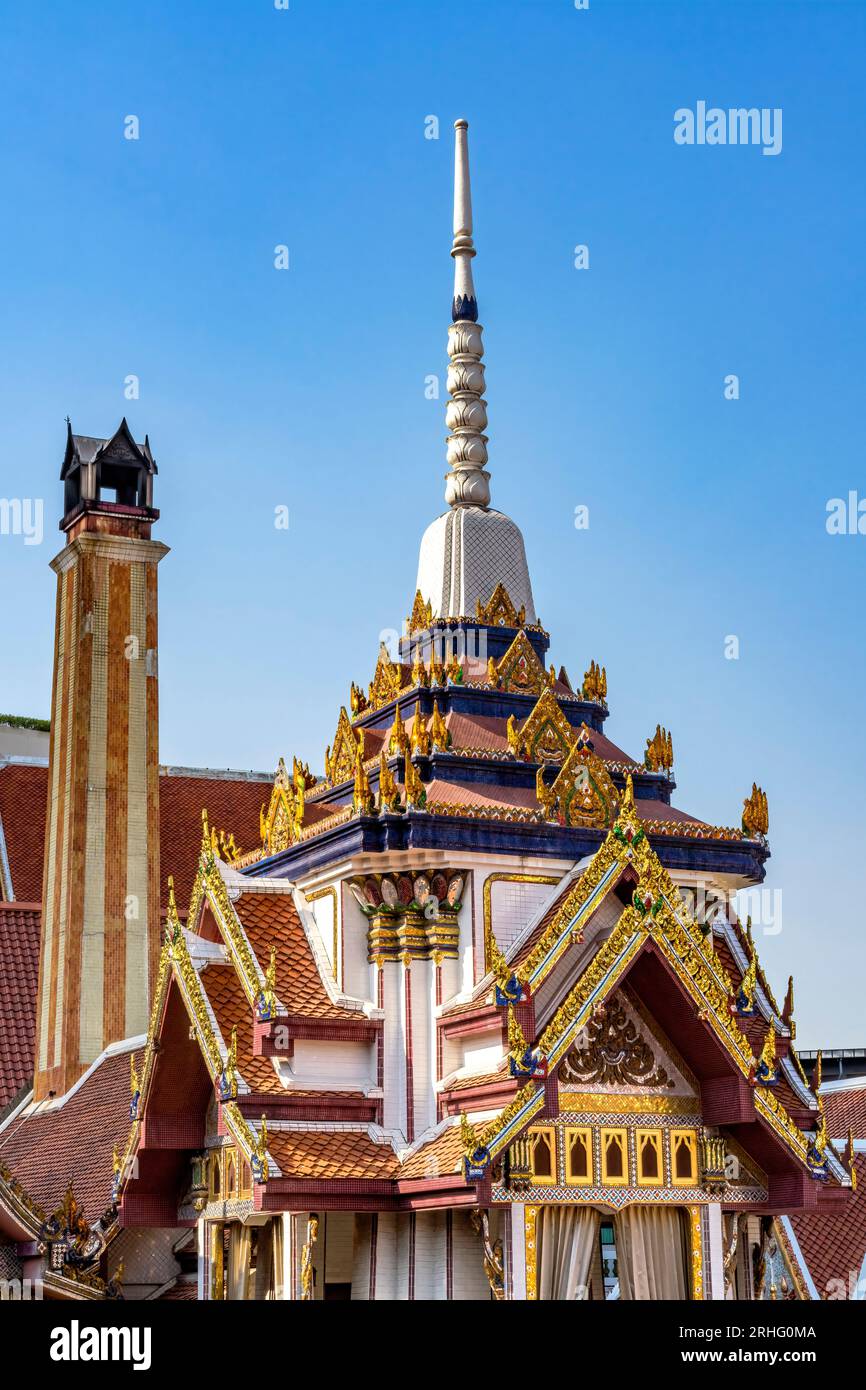 Colorful Golden Ornate Chedi Pagoda Wat That Sanarun Sunthikaram Community Temple Bangkok Thailand. Small old Temple in a neighborhood in Bangkok. Stock Photo