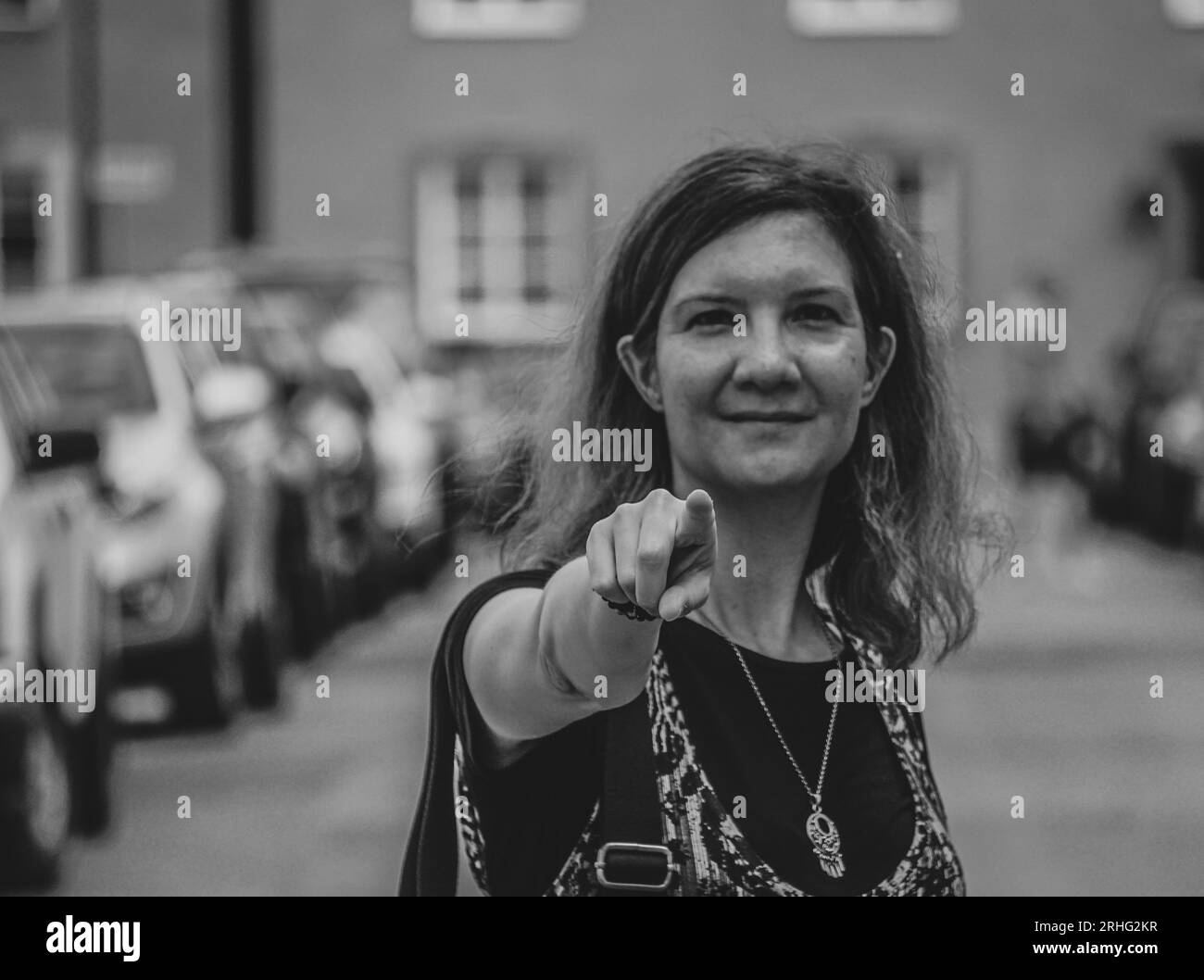 Portrait of a woman pointing at the camera Stock Photo
