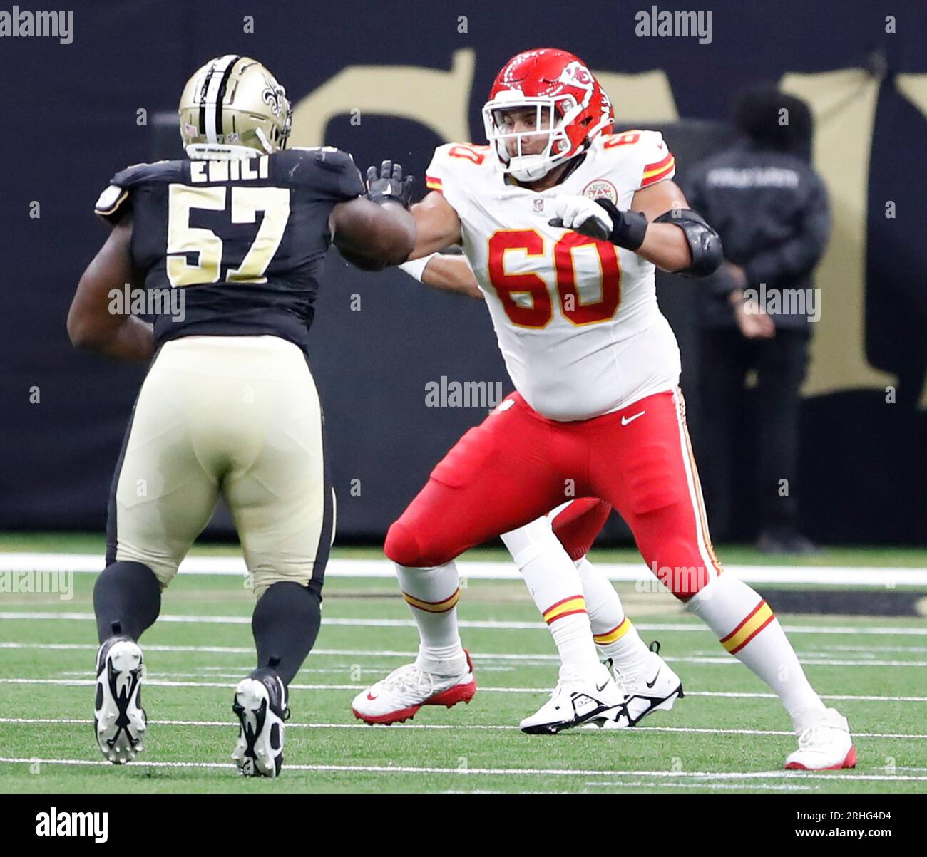 New Orleans, USA. 13th Aug, 2023. Kansas City Chiefs offensive tackle Sebastian Gutierrez (60) blocks New Orleans Saints defensive tackle Prince Emili (57) during a National Football League preseason game at the Caesars Superdome in New Orleans, Louisiana on Sunday, August 13, 2023. (Photo by Peter G. Forest/Sipa USA) Credit: Sipa USA/Alamy Live News Stock Photo