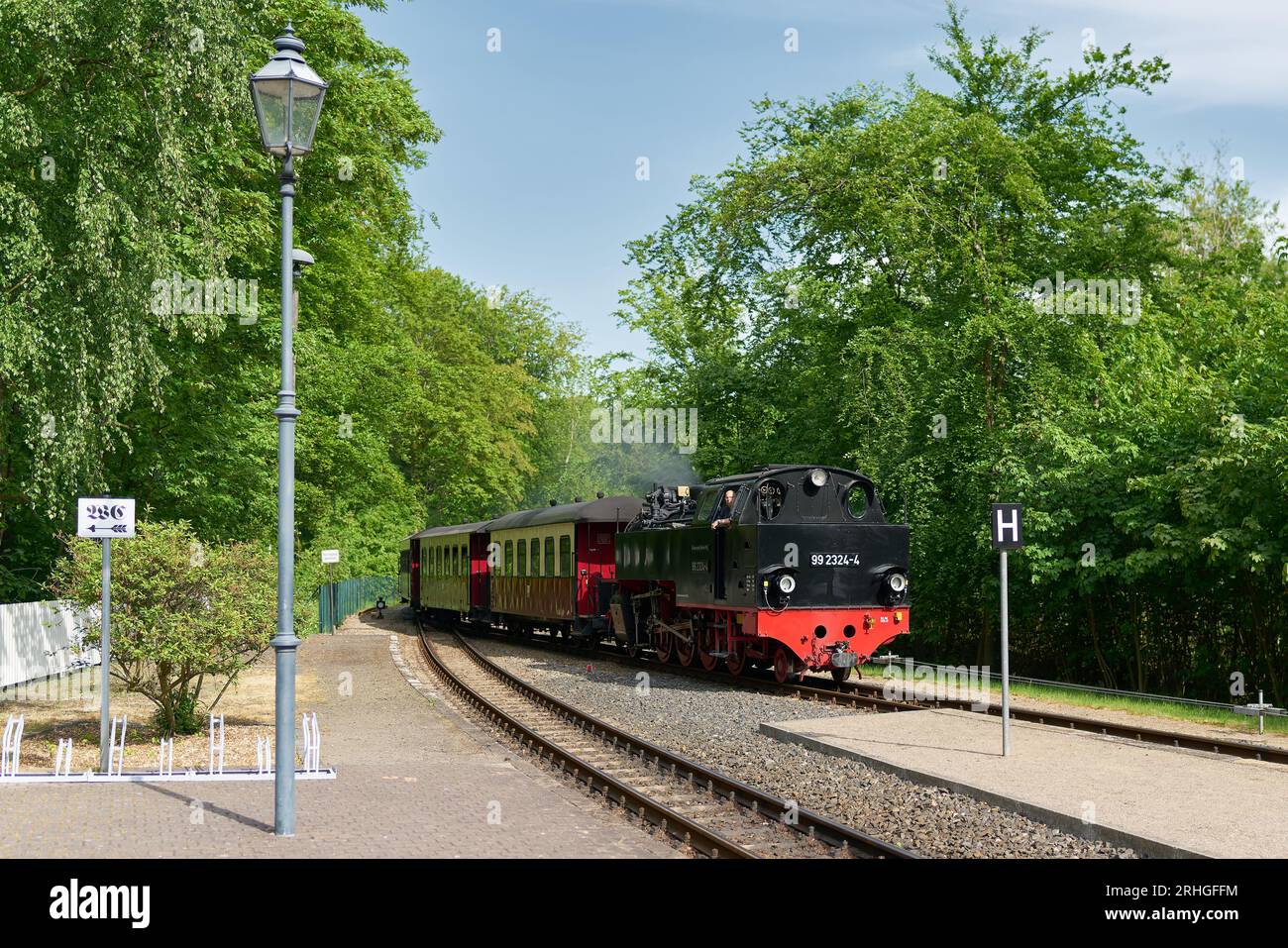 Tourist train Molli entering the station of Heiligendamm on the Baltic Sea in Germany Stock Photo