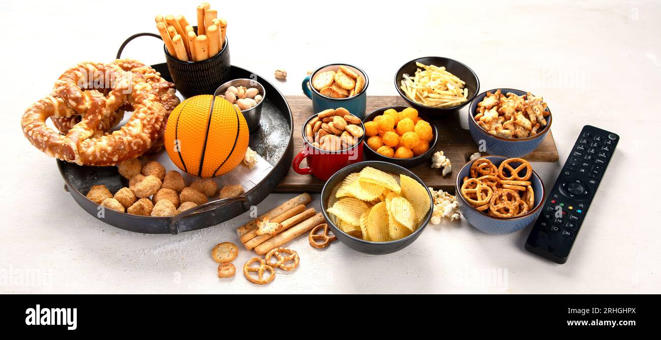 Set of various basketball fans and stadium snacks, chips, sauces on a ...