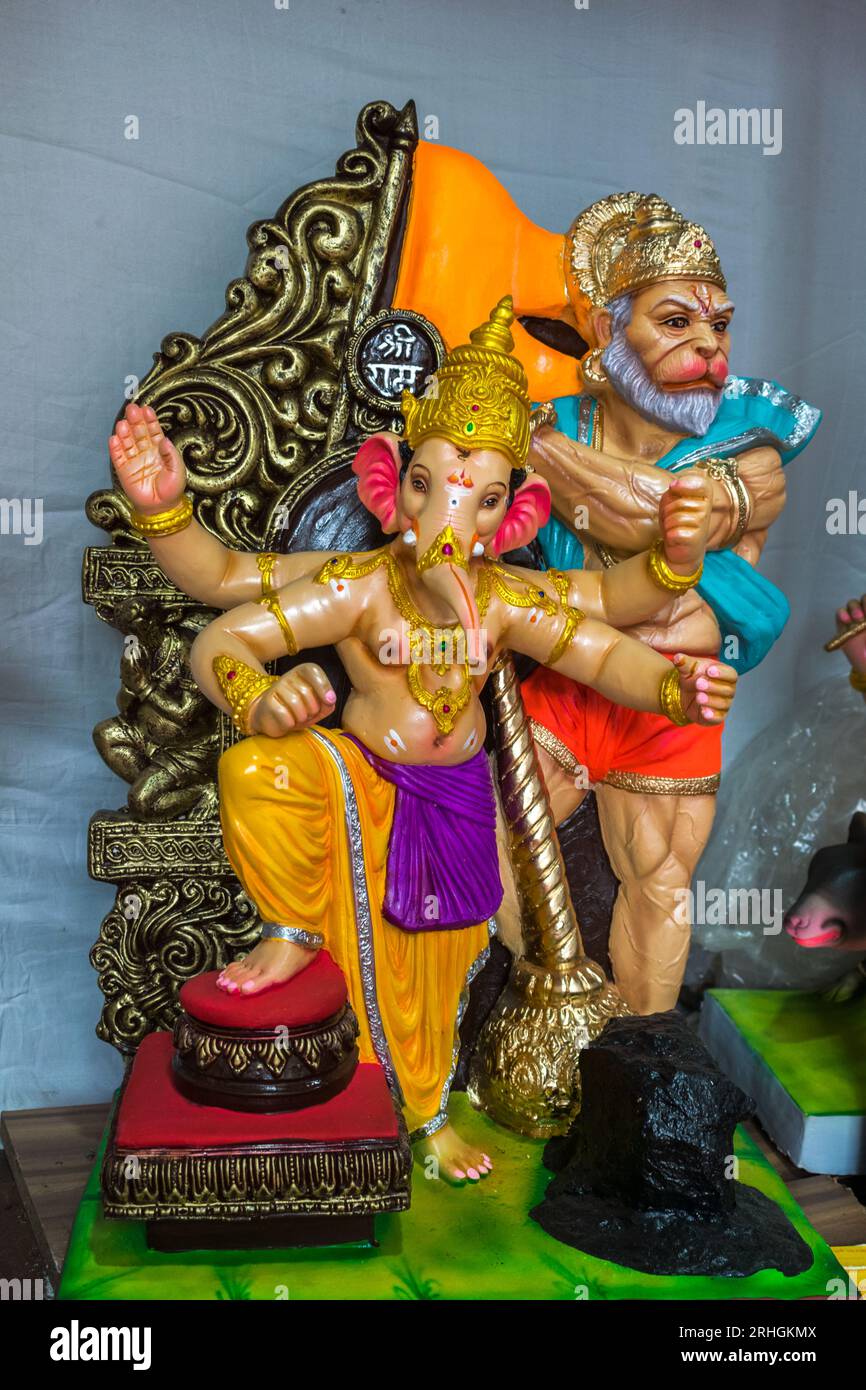 A beautiful idol of Lord Ganpati and Hanuman on display at a workshop in Mumbai, India for the festival of Ganesh Chaturthi Stock Photo