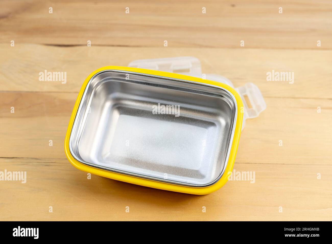 New empty stillness steel lunch box on a wooden background Stock Photo