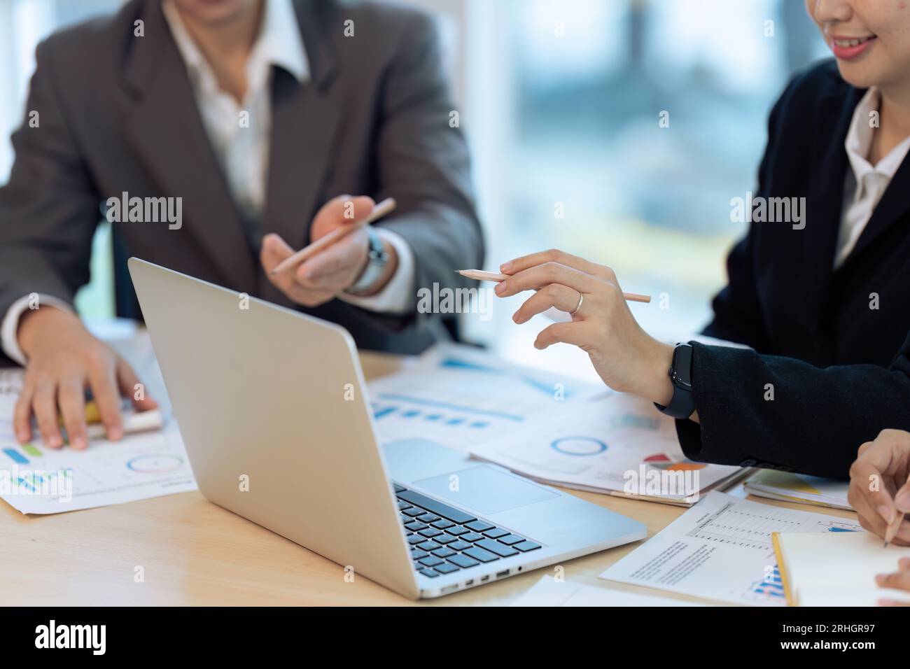 Business partners sharing ideas hi-res stock photography and images - Alamy