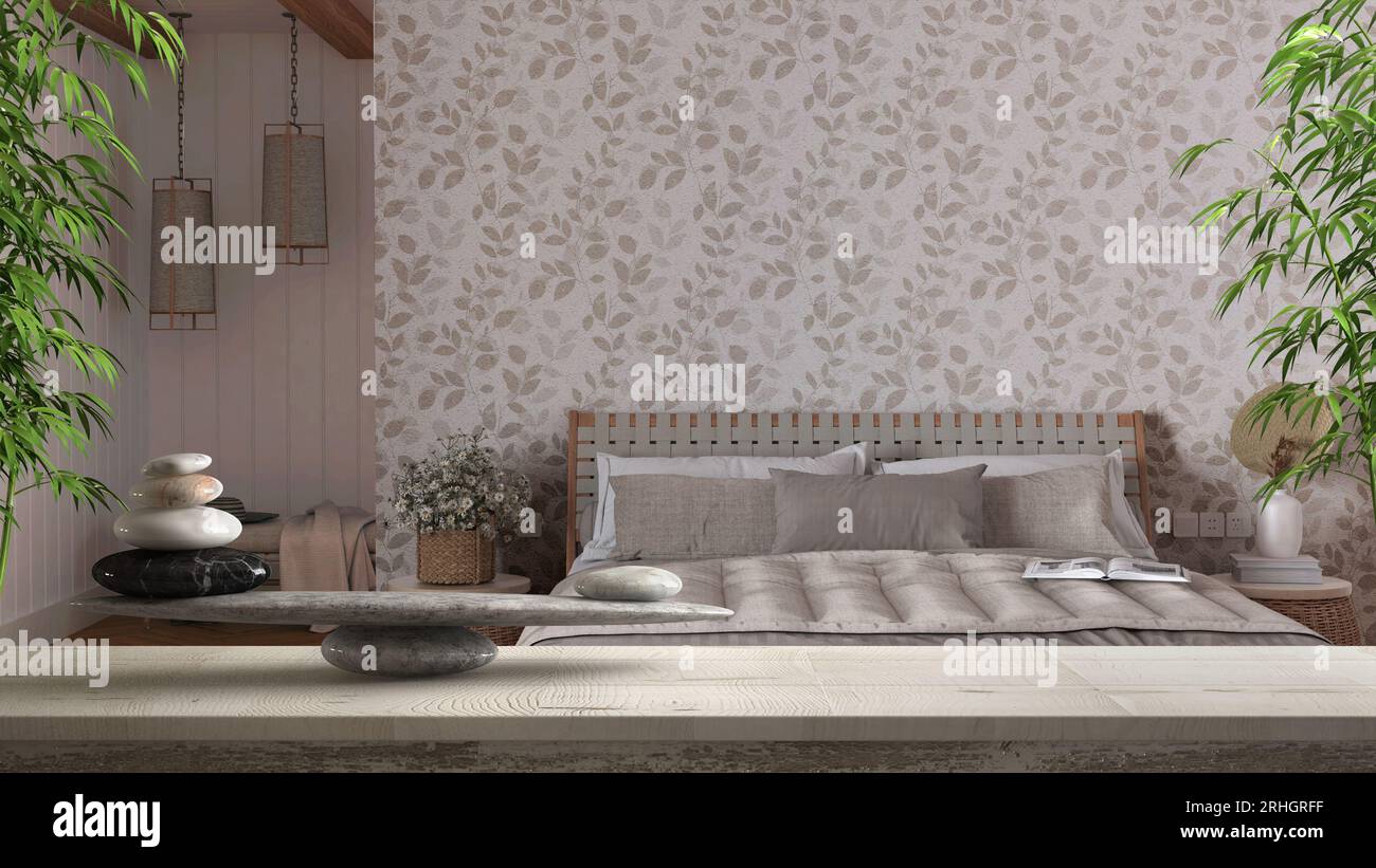 Wooden vintage table or shelf with stone balance, over japandi bedroom with bed and wallpaper