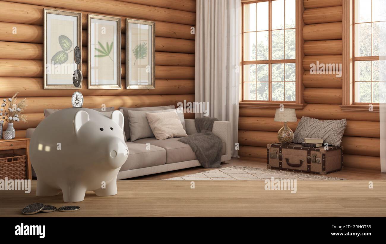 Wooden table top or shelf with white piggy bank with coins, log cabin ...