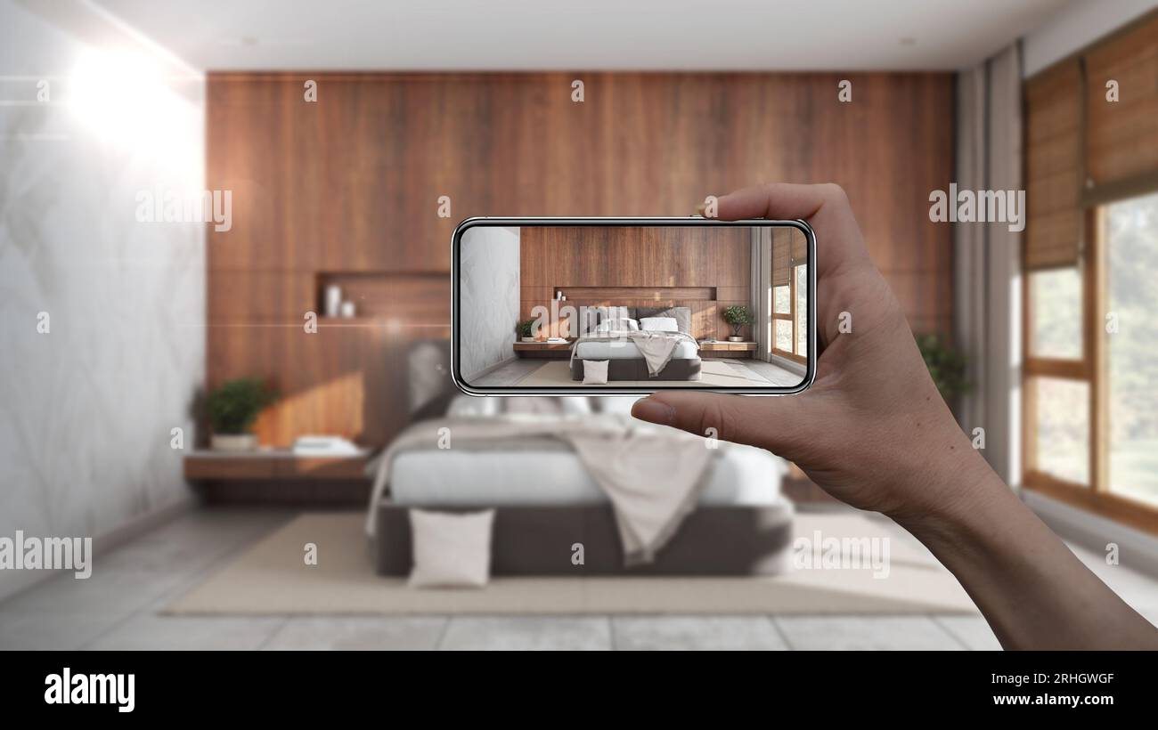 Hand holding smart phone, AR application, simulate furniture and ...
