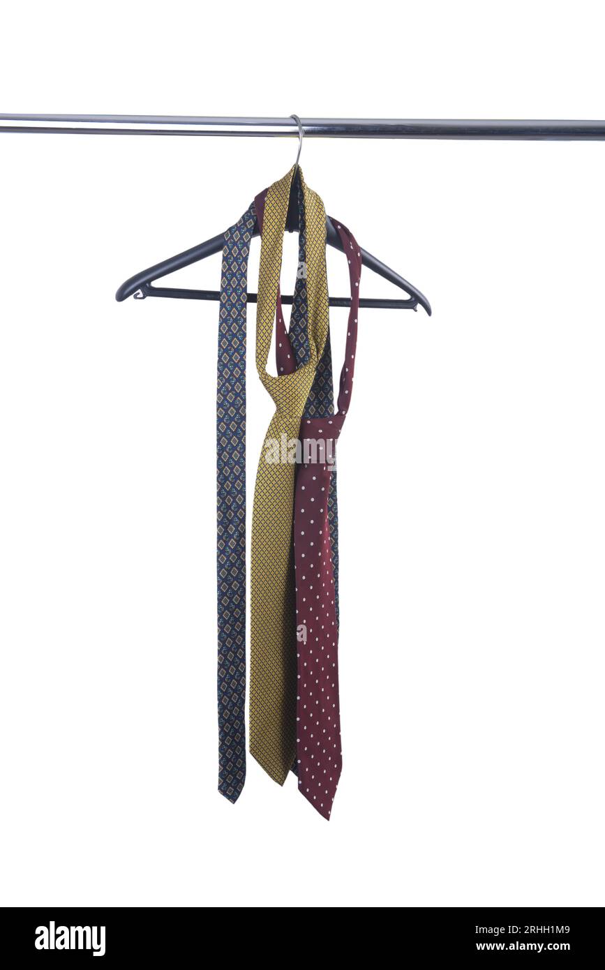 a hanger with some hanging ties on a transparent background Stock Photo