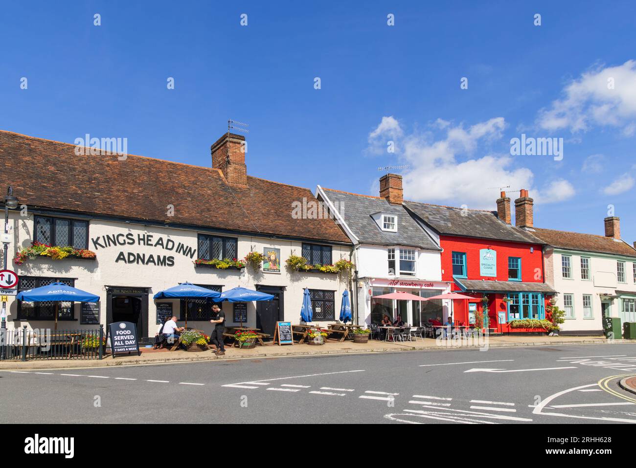 View of colourful buildings in Market Hill, Woodbridge, Suffolk. UK