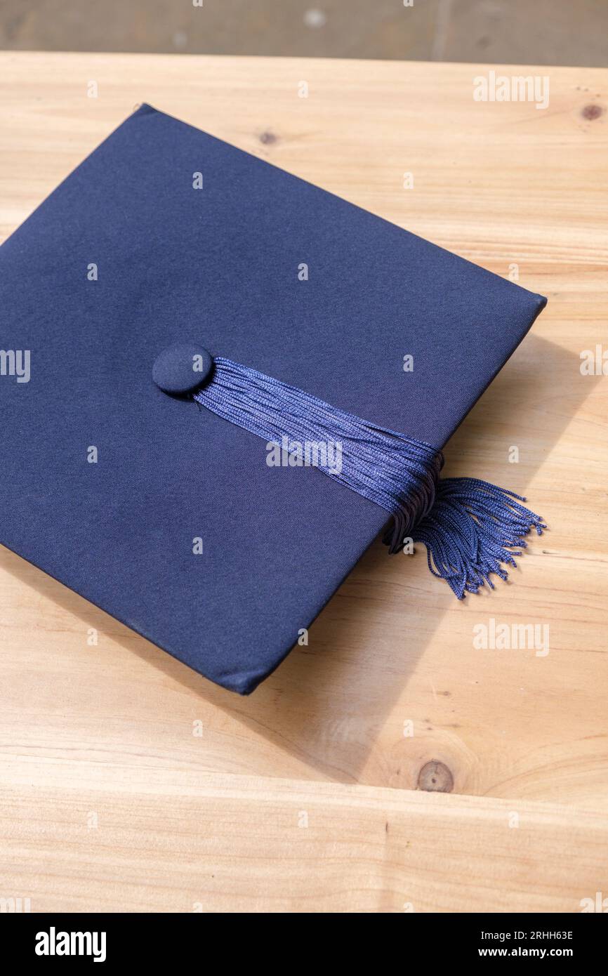 A traditional mortar board cap worn at University graduation ceremonies